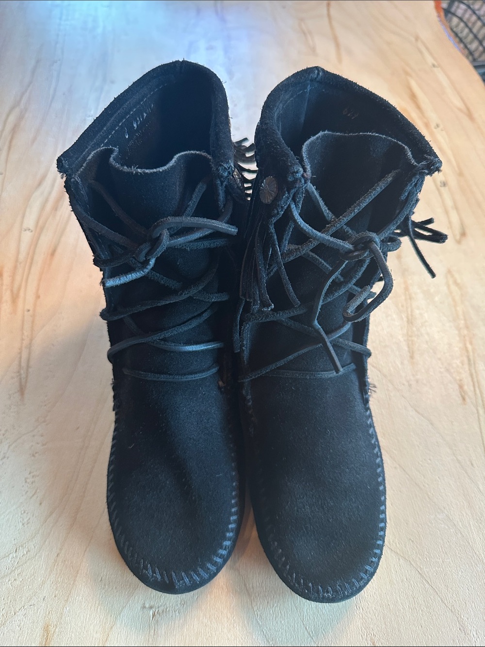 Minnetonka lace up fringe booties